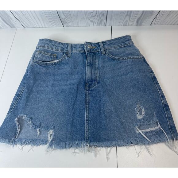 Forever 21 Women's Denim Mini Skirt Size Medium Destressed Blue Distressed Hem - Picture 1 of 6